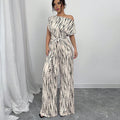 KENDI™ - Classy Wide-Leg Oblique Strap Jumpsuit